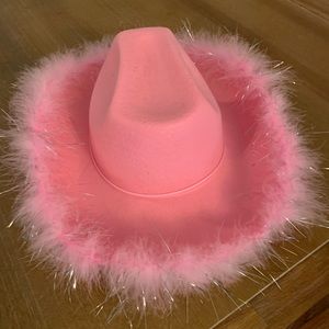 Hot pink cowboy hat with feather trim